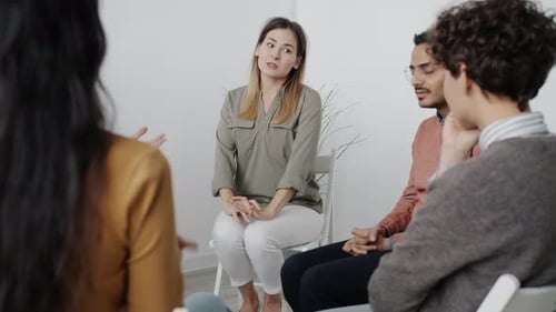 Woman Talking in Therapy Support Group Session