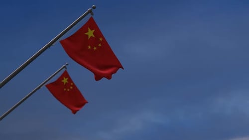 Realistic Chinese Flag Waving Against Blue Sky