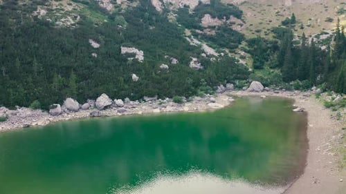 Reflecting in Green Lake in Mountain on Montenegro