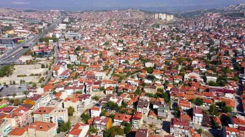 Aerial Drone View of City Buildings with Red Roofs