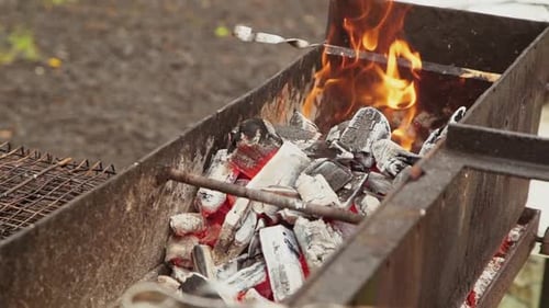 Hot Coals Burning in an Outdoor Grill