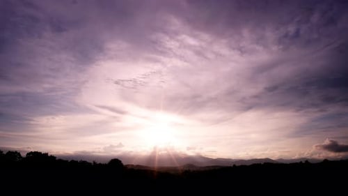 Dramatic Cumulus tropical cinematic cloudscape building up over the mountain turning into a tropical