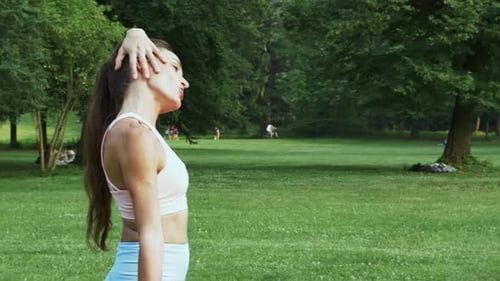 Women Exercising Together in Green Park