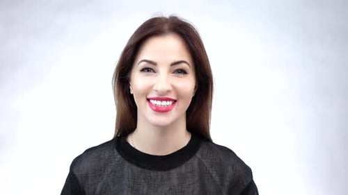 Attractive Woman Smiling with Red Lipstick on White