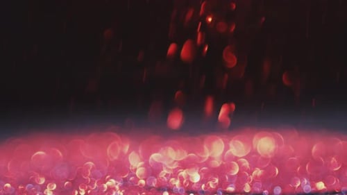 Glitter Sparkling against Black Background