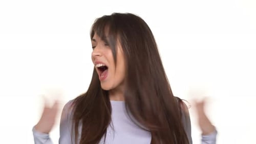 Woman Cheering and Smiling on White Background