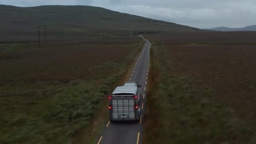 Forwards Tracking of Offroad Car with Horse Trailer Driving on Narrow Road in Countryside
