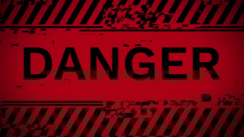 Warnhinweis — roter Warnmeldungstext auf dem Bildschirm