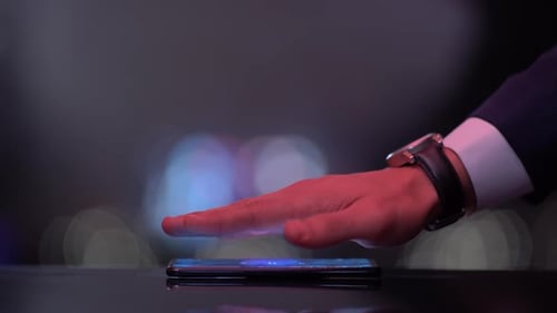Hand Over Phone Reveals Hologram Word Crm
