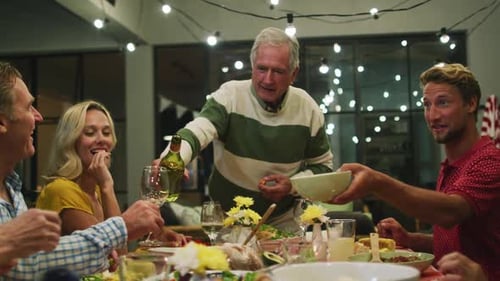 Joyful Dinner Gathering of Family and Friends