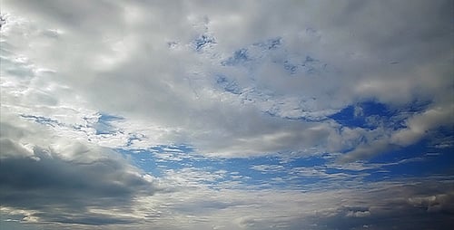 Timelapse of Clouds Moving Across a Blue Sky