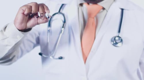 Medical Professional Writes 'True' with Check Mark