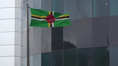 Dominica National Flag Waving in Front of Modern Building