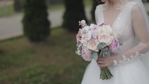 Bride Holding a Bouquet of Flowers on Wedding Day