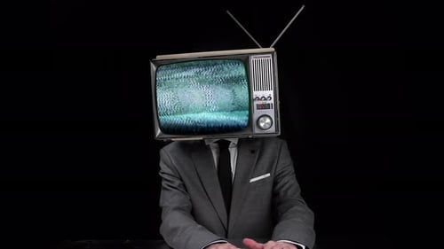 Television Head Man Typing at Desk