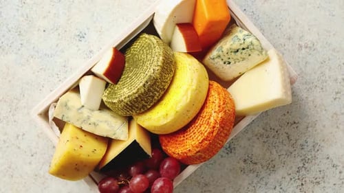 Colorful Cheese and Grapes on a Tray
