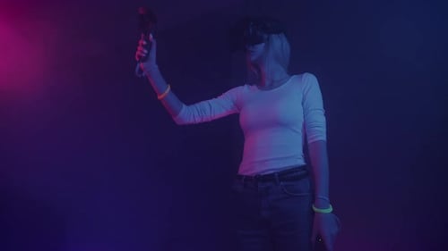 Young Adult Using Virtual Reality Headset in Studio