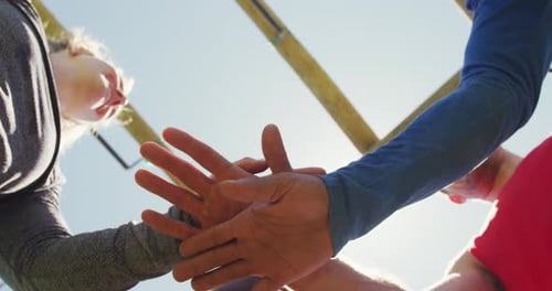 Hands Together Representing Teamwork and Support