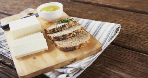 Close Up of Bread, Cheese, and Olive Oil