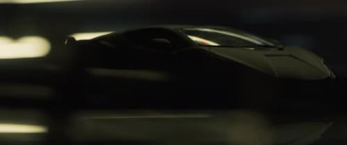 Sleek Sports Car in High-Speed Motion