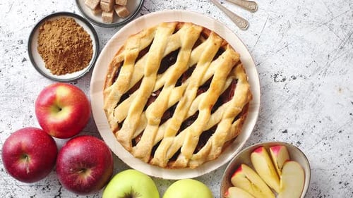 Delicious Apple Pie Cake with a Fresh Fruits, Brown and Powder Sugar