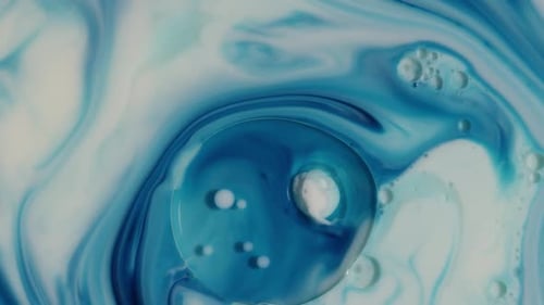 Abstract Blue and White Swirling Liquid