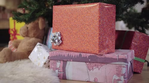 Colorful Christmas Presents Under a Festive Tree