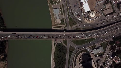 Drone's Eye View - Aerial Top Down View of Urban Traffic Jam on a Car Bridge.