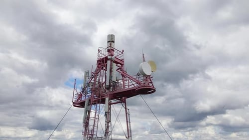 Aerial View of Telecommunications Cell Phone Tower with Wireless Communication Antennas for Network