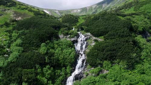 Aerial View of Beautiful Mountain Waterfall in Wilderness