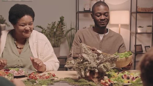 Family Enjoys Festive Dinner Together at Home