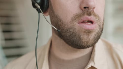 Cropped Face of Man with Headset