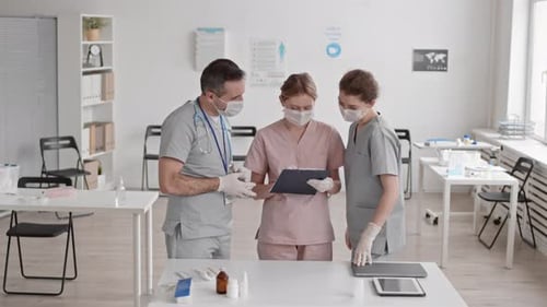 Doctors Talking in Hospital in Morning