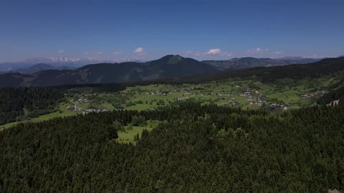 Aerial View of Village in Mountainous Landscape