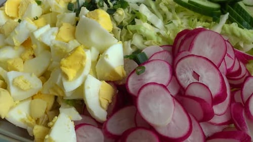 Spring Salad Ingredients: Eggs, Radishes, Cucumber, Cabbage