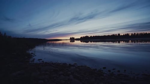 Picturesque Lake Reflects Dramatic Sunset