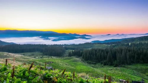 Picturesque Mountain Valley at Sunrise with Fog
