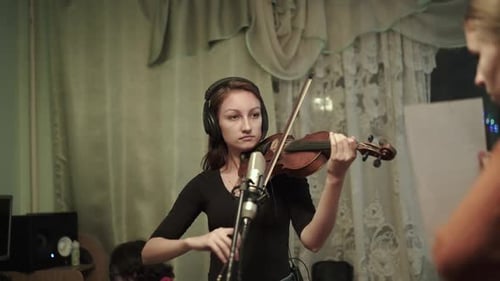 Violinist Recording Music in Home Studio