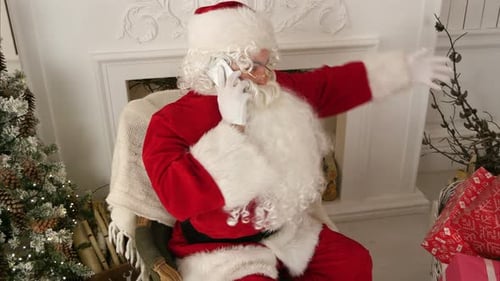 Santa Claus Talking on Phone Indoors
