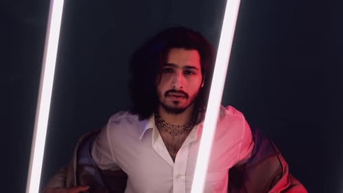 Man Puts On Blazer With Neon Lights