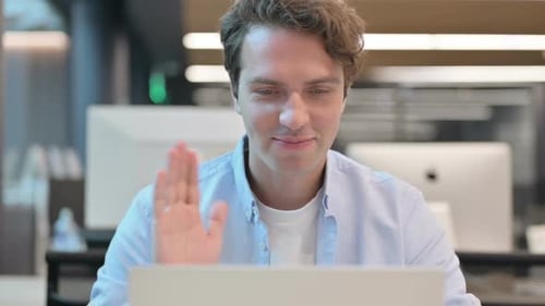 Close Up of Man Talking on Video Call on Laptop