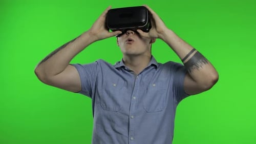 Young Adult Immersed in Virtual Reality Experience
