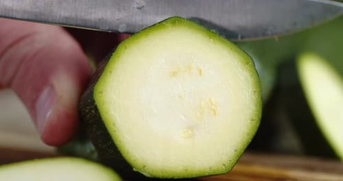 Slicing Fresh Zucchini in the Kitchen