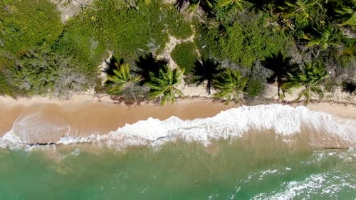 Aerial View of Tropical White Sand Beach and Turquoise Clear Sea Water with Small Waves.