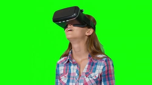 Woman Wearing VR Headset on Green Screen