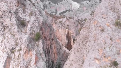 Narrow mountain canyon in Turkey. Flying through rocky mountains.