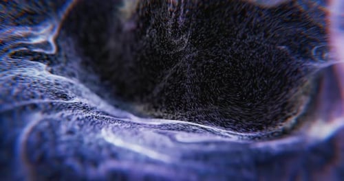 Abstract light particles flowing on black background.