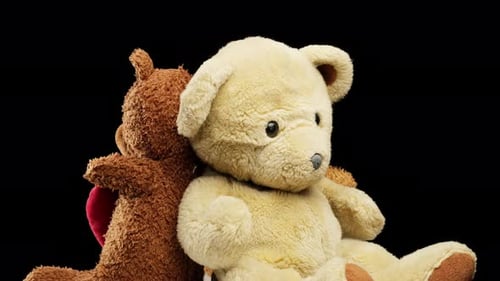 Teddy Bears Together with Red Heart on Black