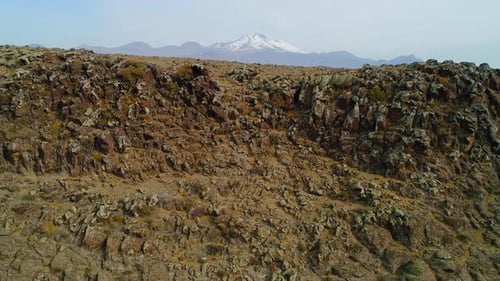 Hill And Mountain In The Background
