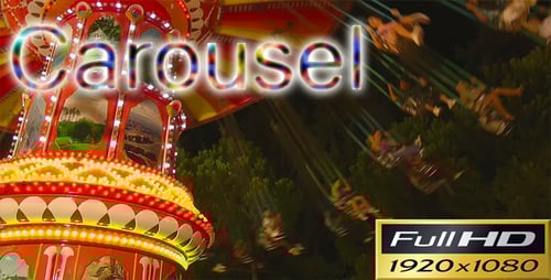 People on a Spinning Carousel Ride at Night